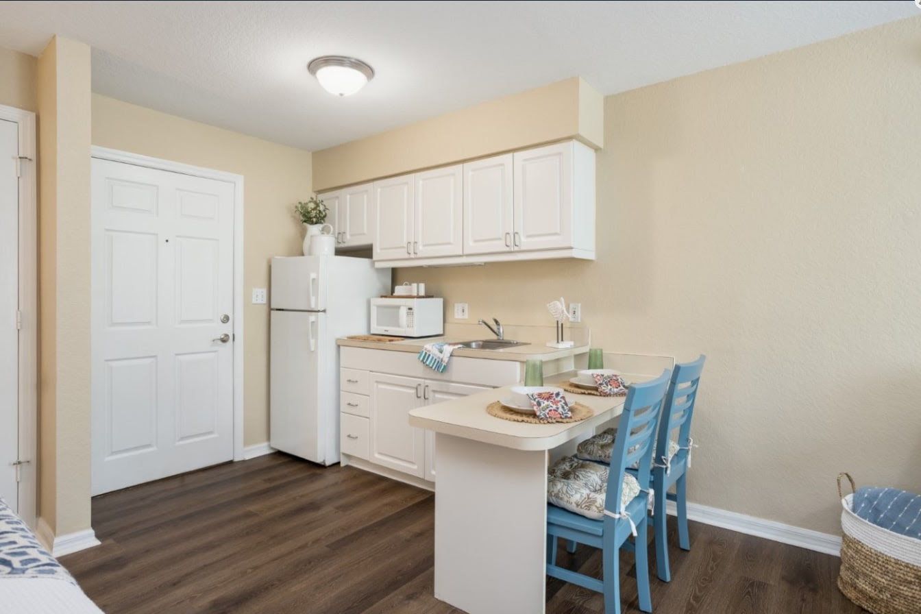 Cozy kitchen area in a resident suite
