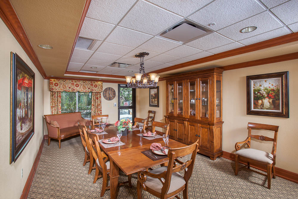 Dining room with a large wooden table and decor