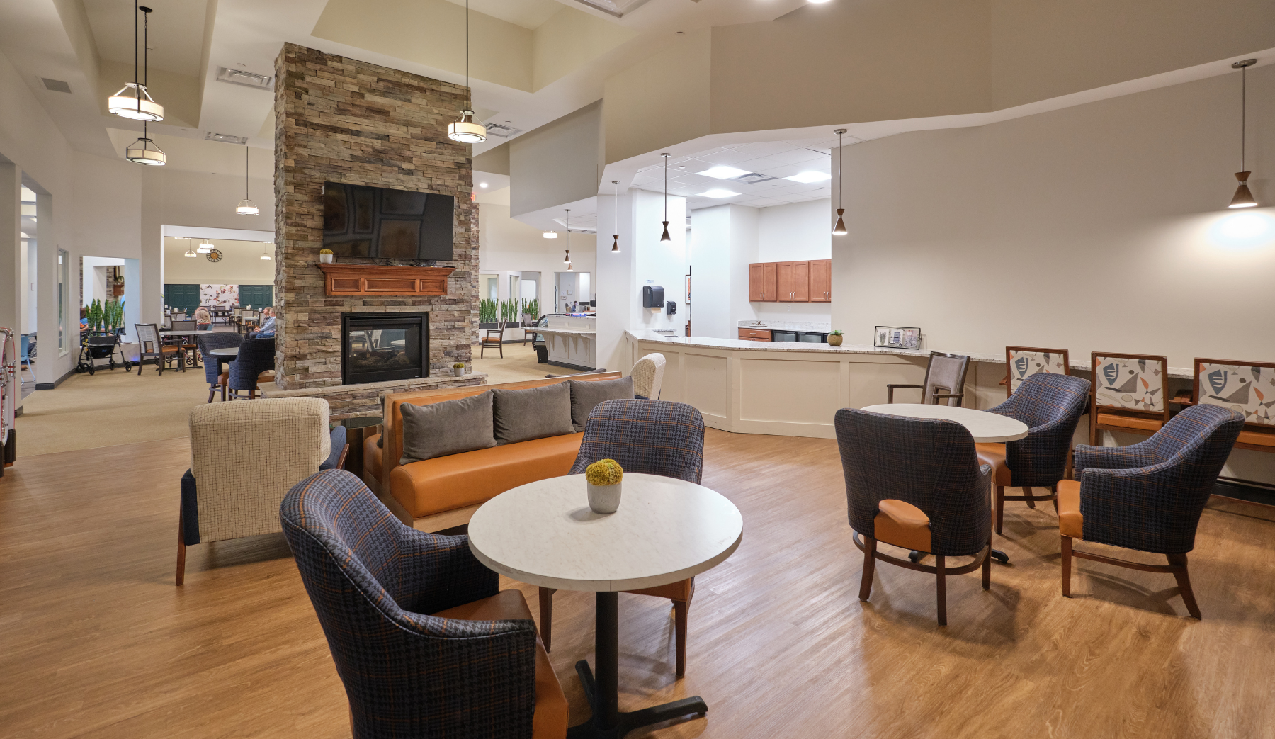 Common area with seating and a fireplace