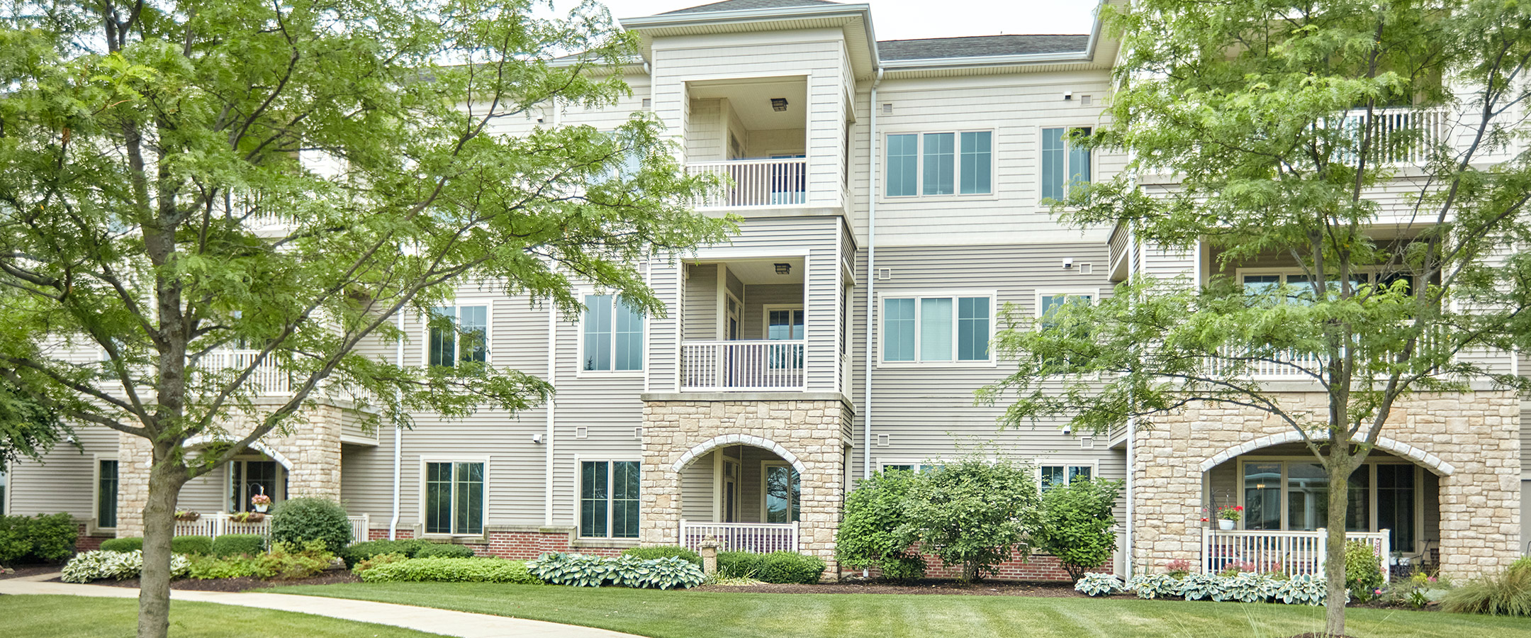 Exterior view of Peterson Meadows Expansion with greenery