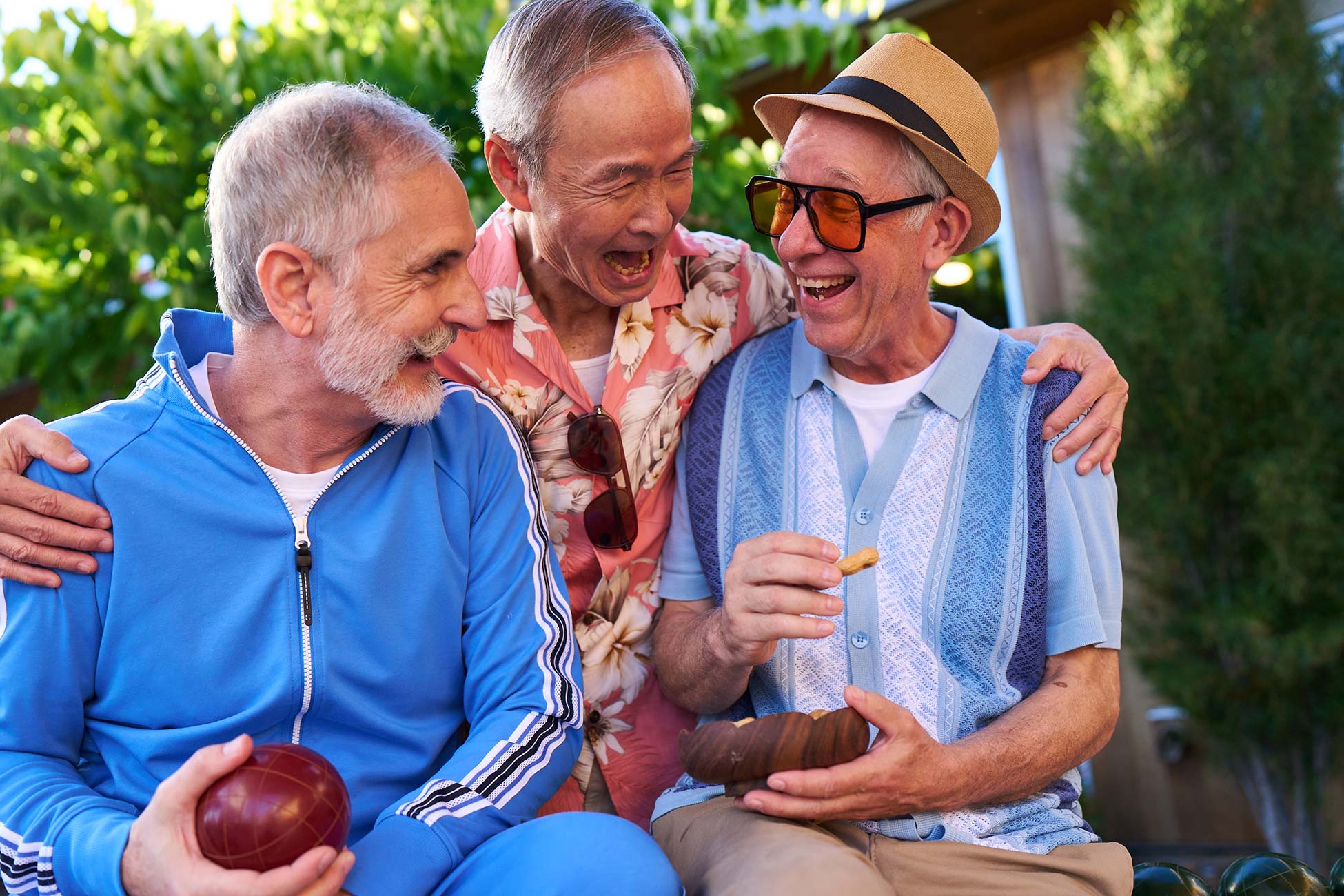 Three residents enjoying outdoor games together