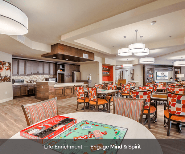 Common area with colorful seating and game on table