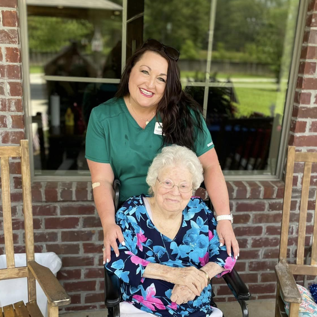 A caregiver and resident enjoying time outside