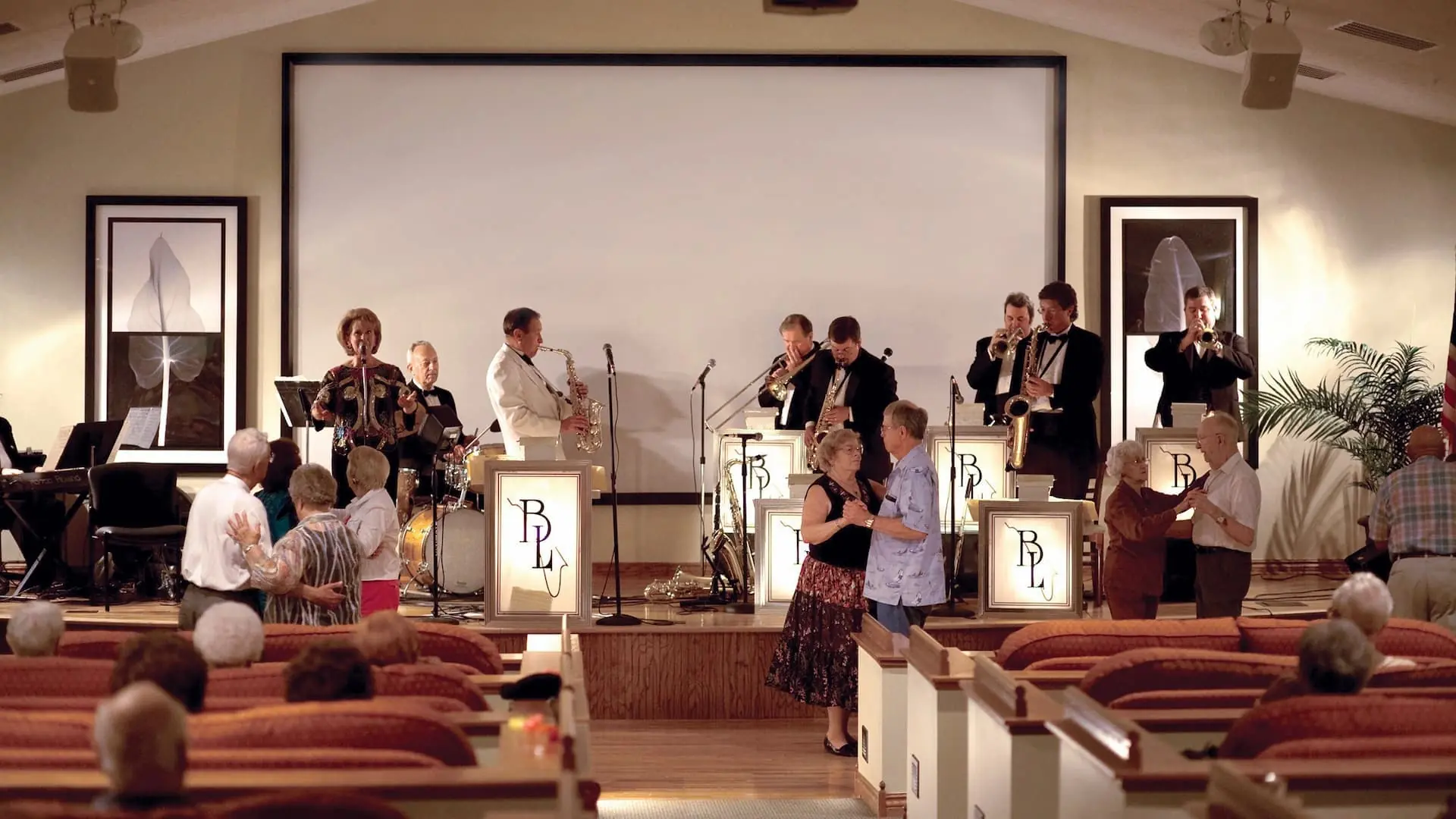 Residents dancing during a live band performance