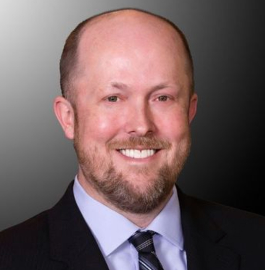 Professional portrait of a man in a suit