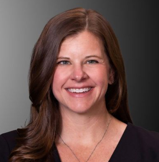 Professional headshot of a woman smiling