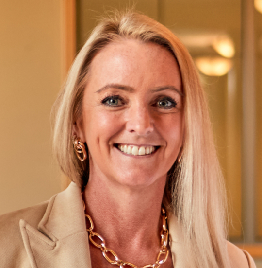 Smiling staff member in a professional setting