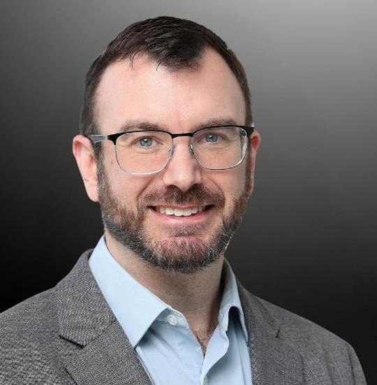 Professional portrait of a man in a suit