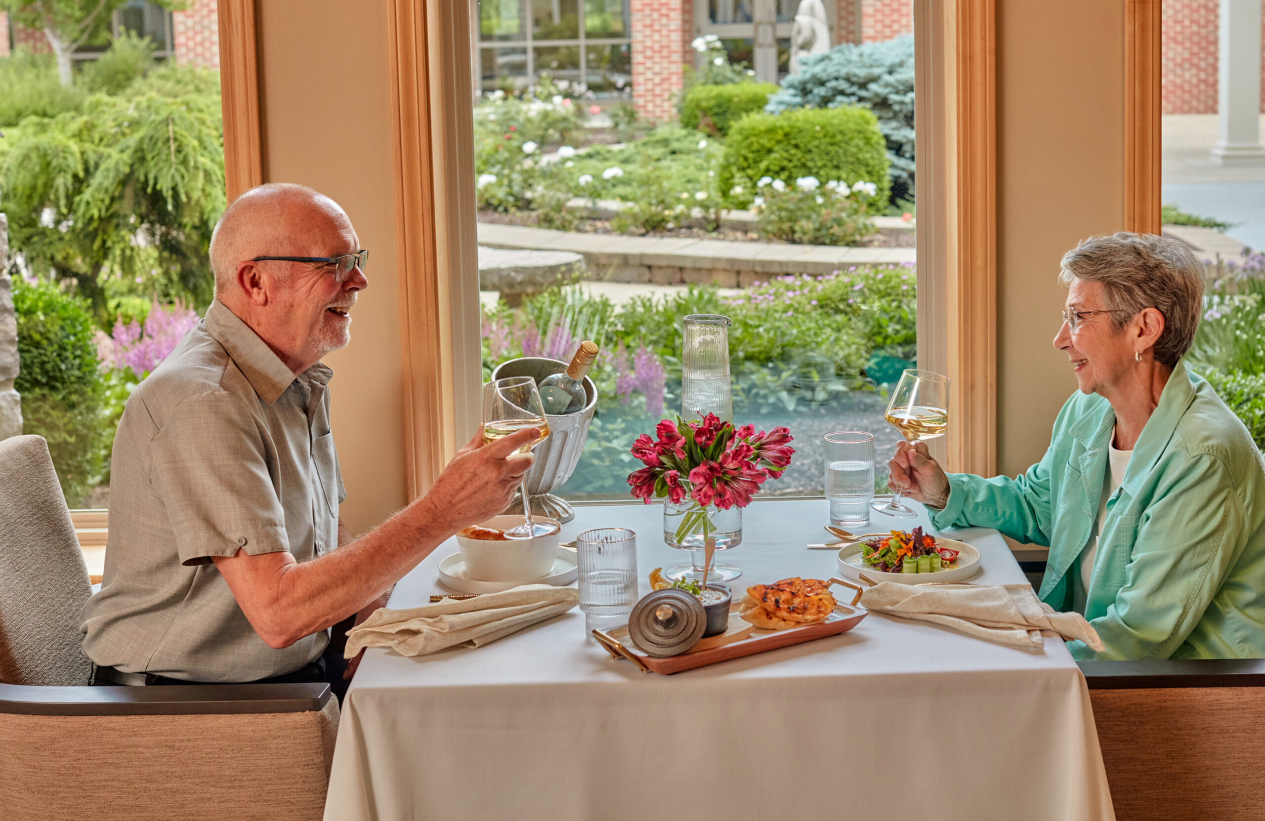 Residents enjoying a meal together in a dining area