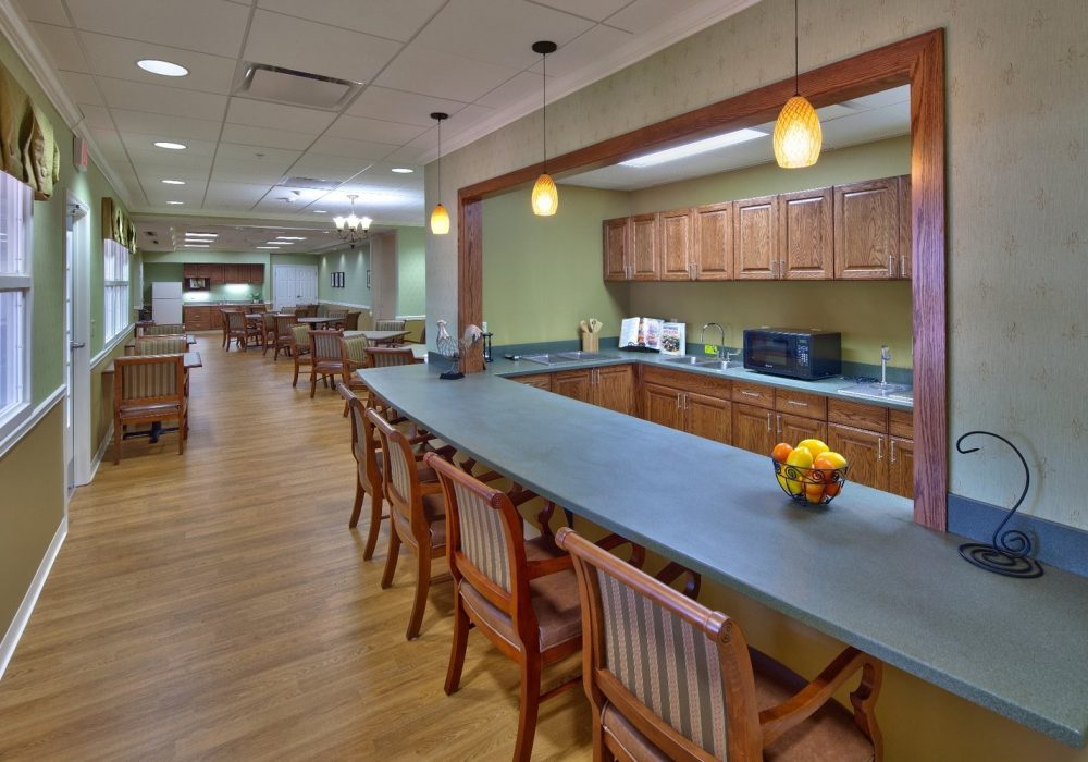 Interior view of a common area with kitchen space