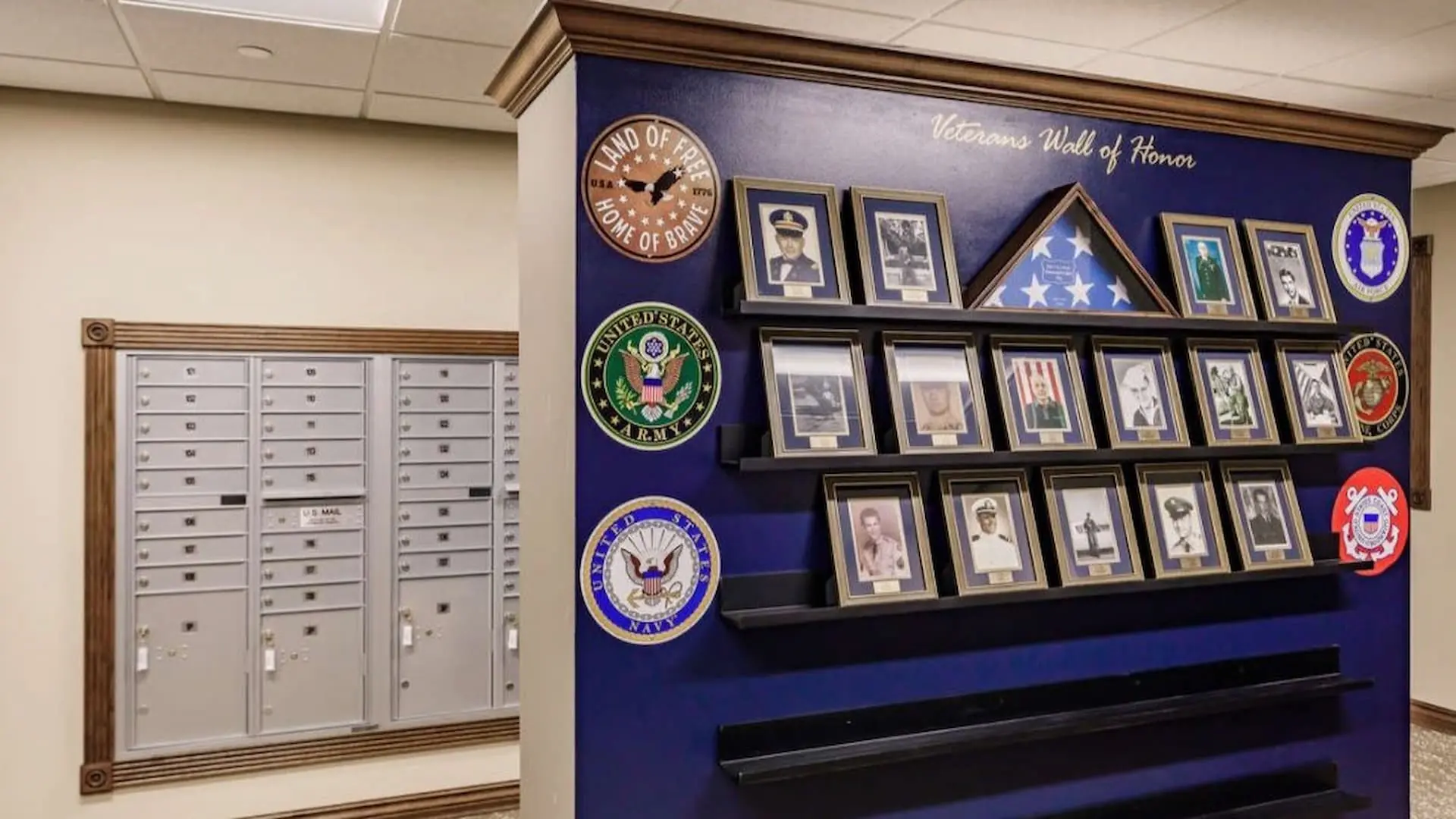 Veterans Wall of Honor with framed photographs