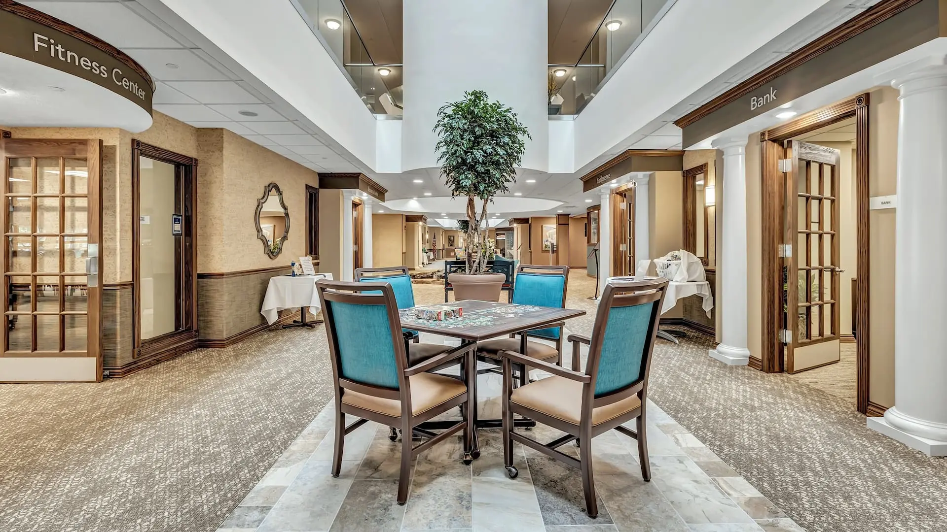 Common area with seating and indoor plants