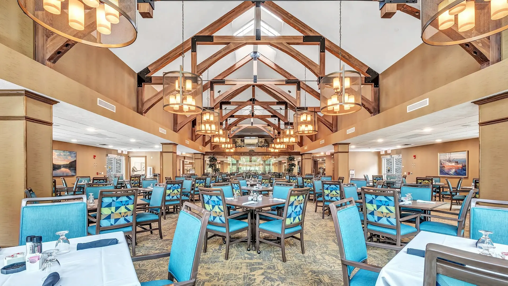 Dining room with decorative chairs and lighting
