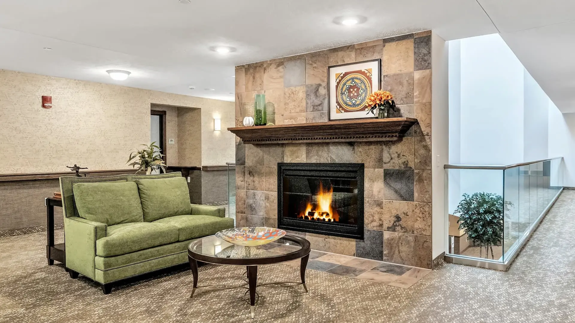 Cozy lobby area with fireplace and seating