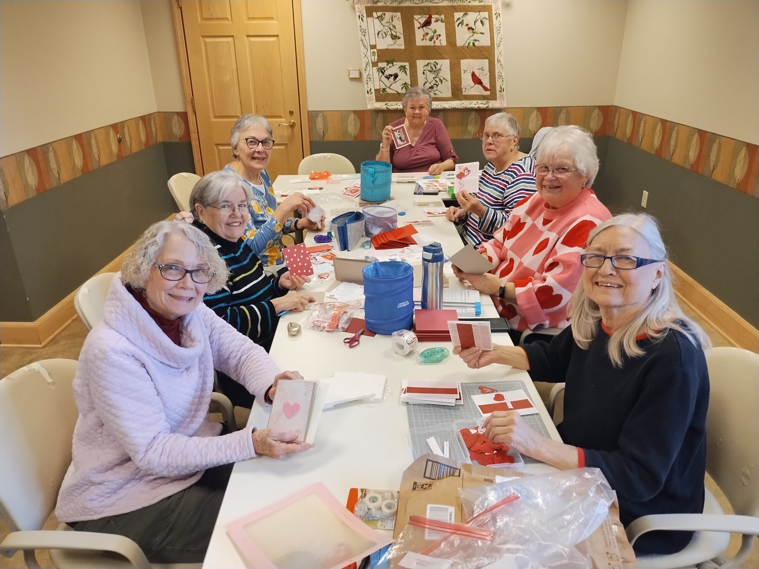 Residents crafting together in an activity room