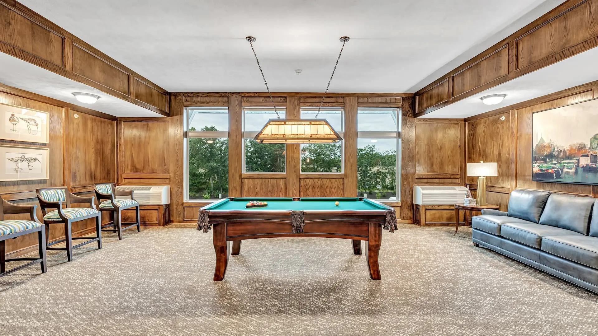 Common area with a pool table and seating