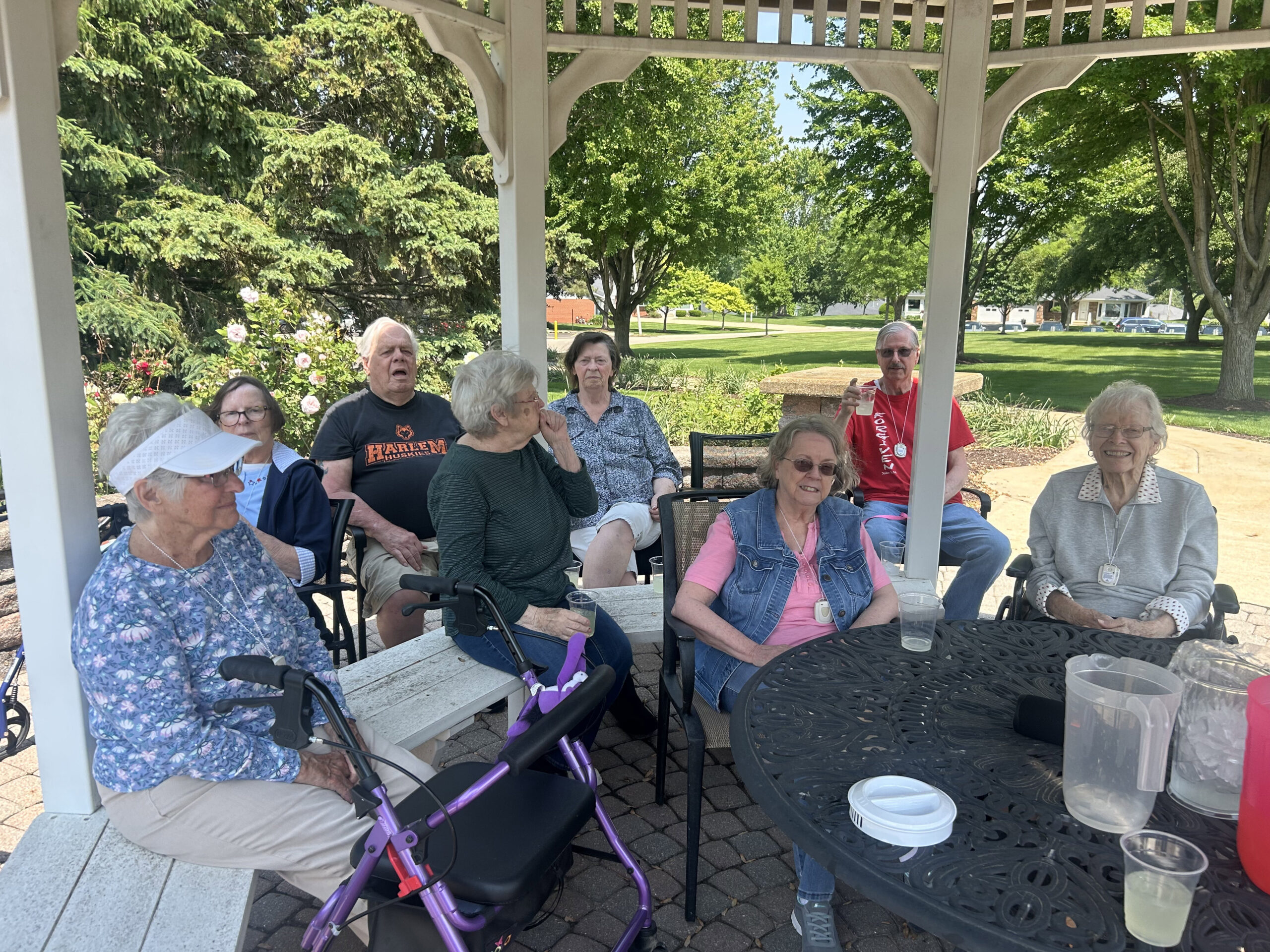 Residents enjoying time together in a gazebo
