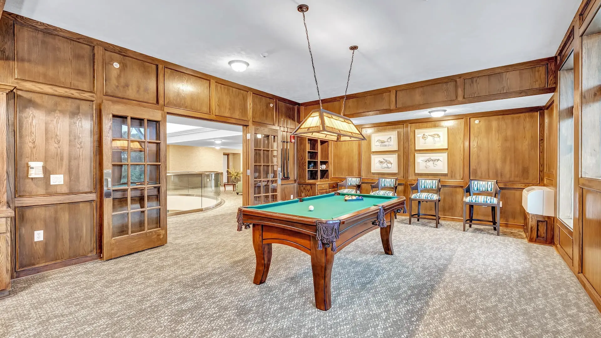 Common area with a billiards table and seating