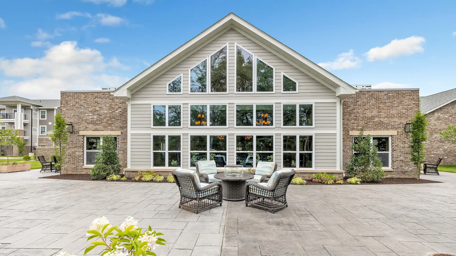 Exterior view of the facility showcasing outdoor seating area