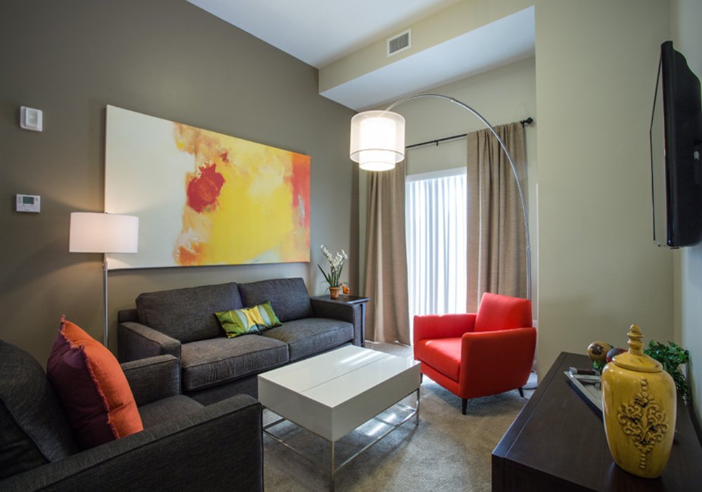 Modern living room setup with furniture and art