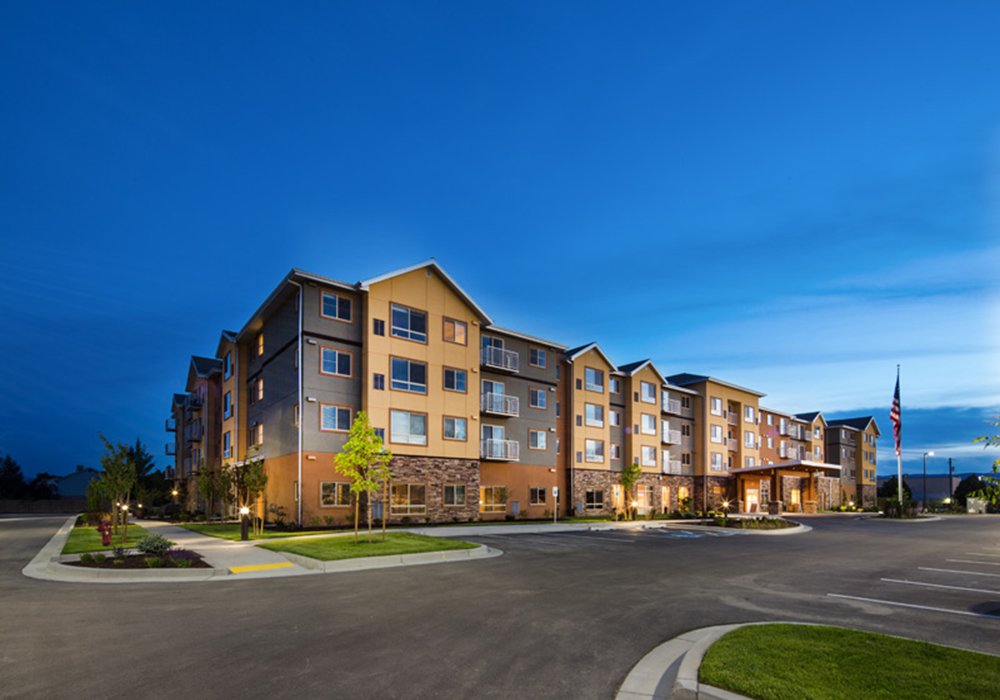 Exterior view of Fairwinds Woodward Park at dusk