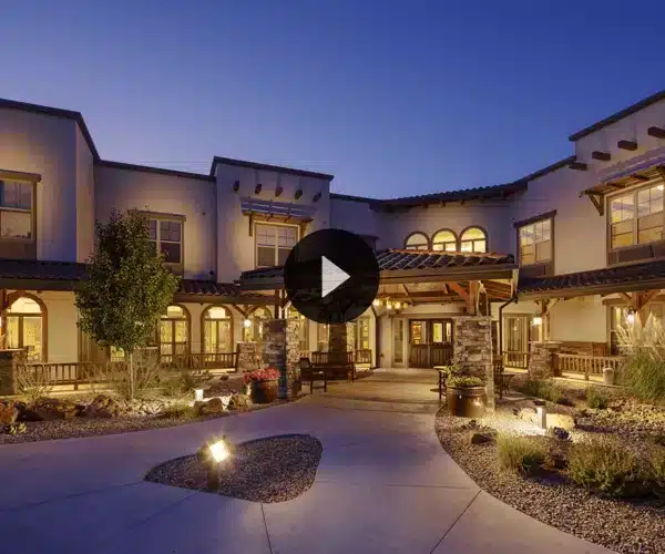 Exterior view of the assisted living facility at dusk