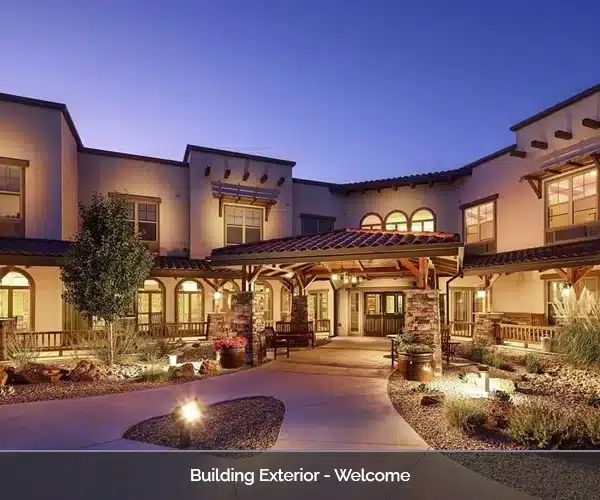 Building exterior with entrance at twilight