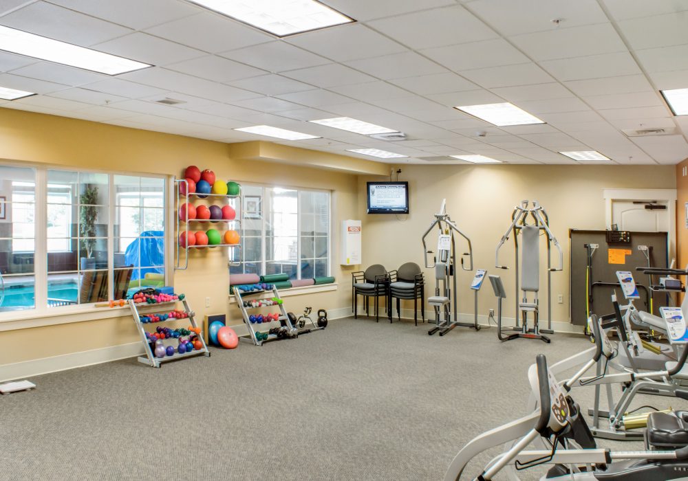 Interior view of a fitness room with exercise equipment