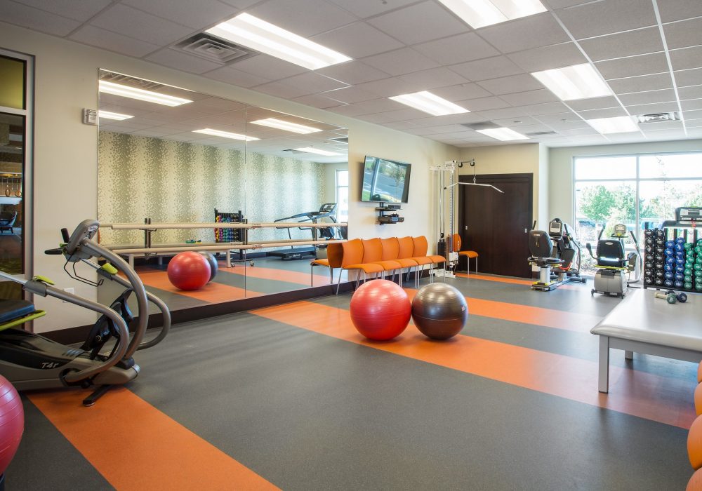 Interior view of a fitness area with exercise equipment