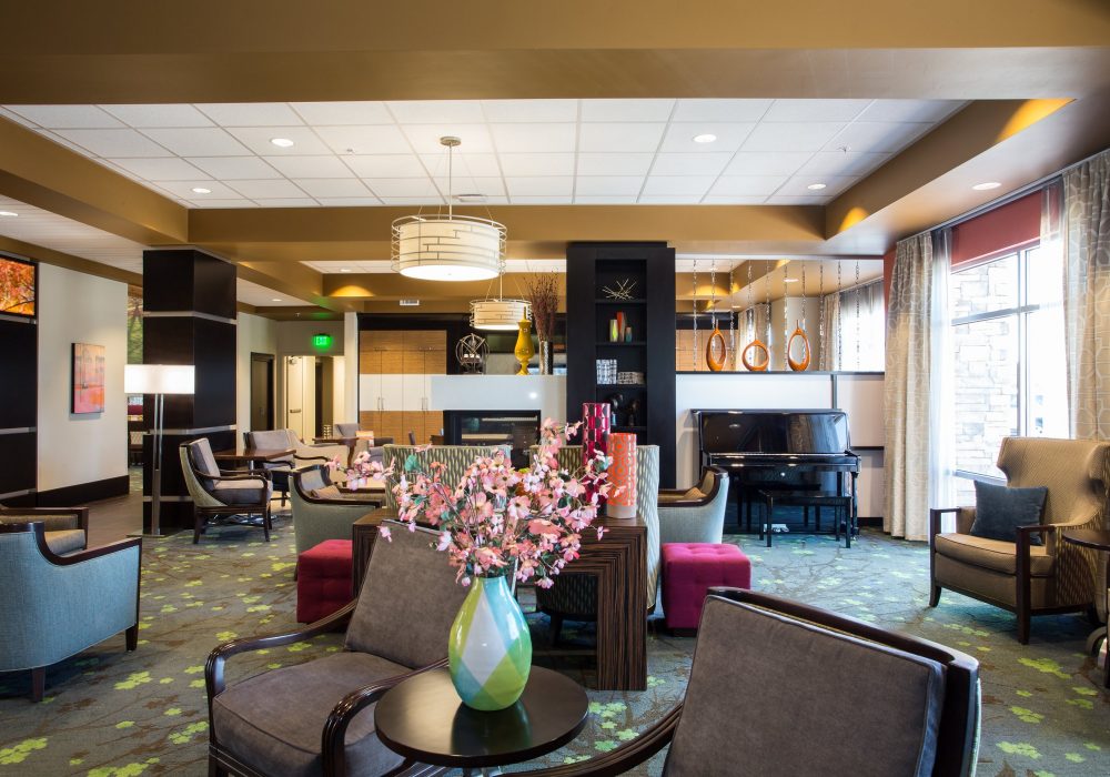 Bright and inviting common area with lounge seating