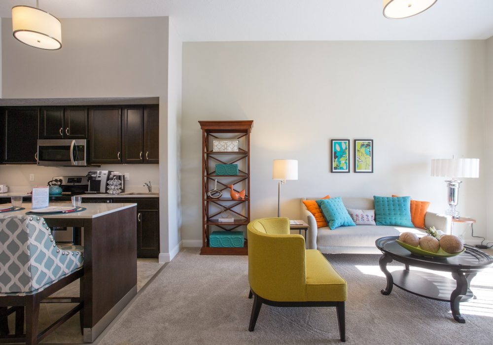 Bright interior of a resident suite with living area