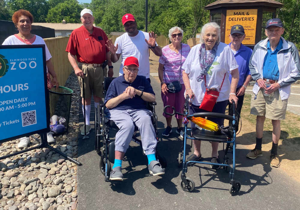 Residents enjoying time outdoors at a facility event