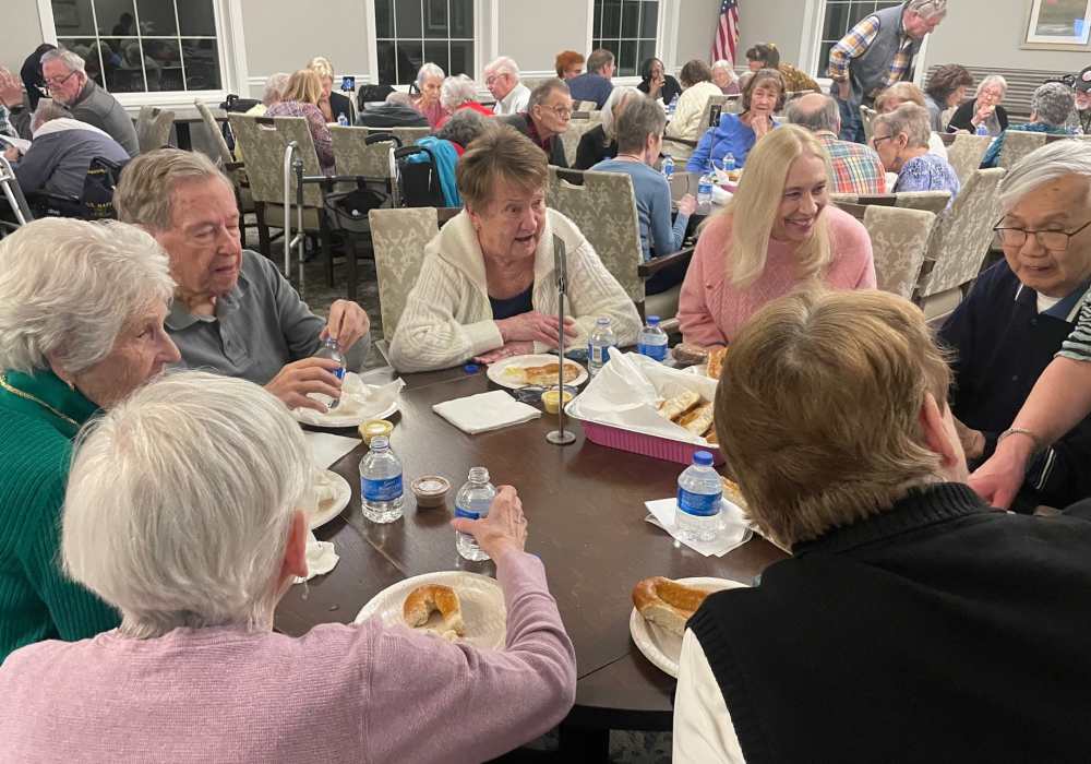 Residents enjoying a meal together in a common area