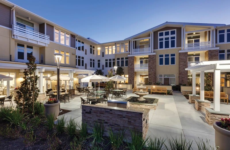Outdoor courtyard with seating and landscaping