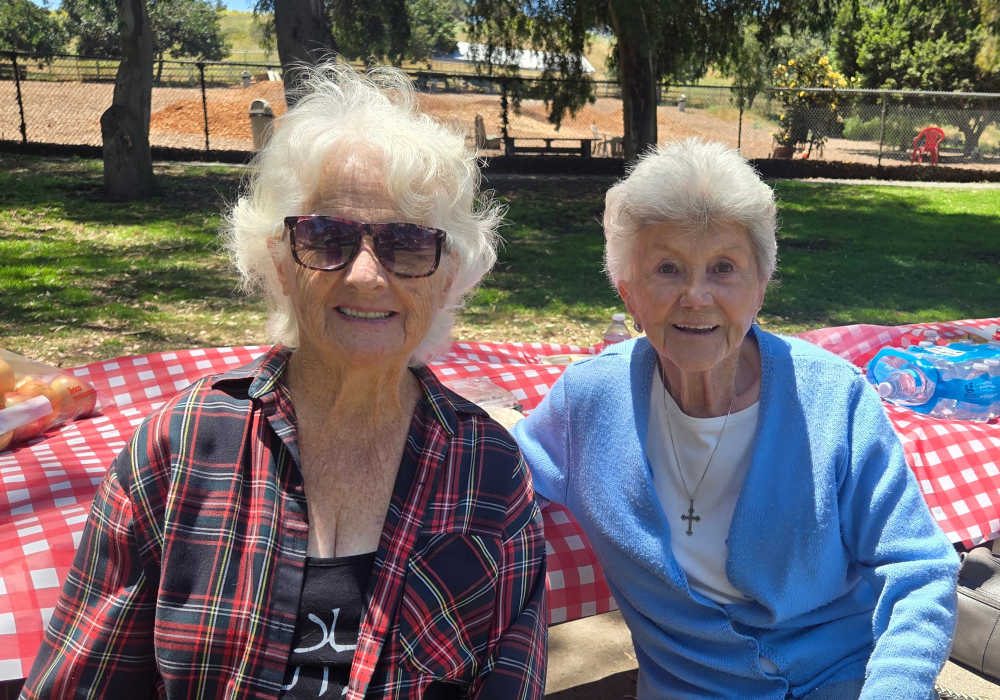 Two female residents enjoying the outdoors together