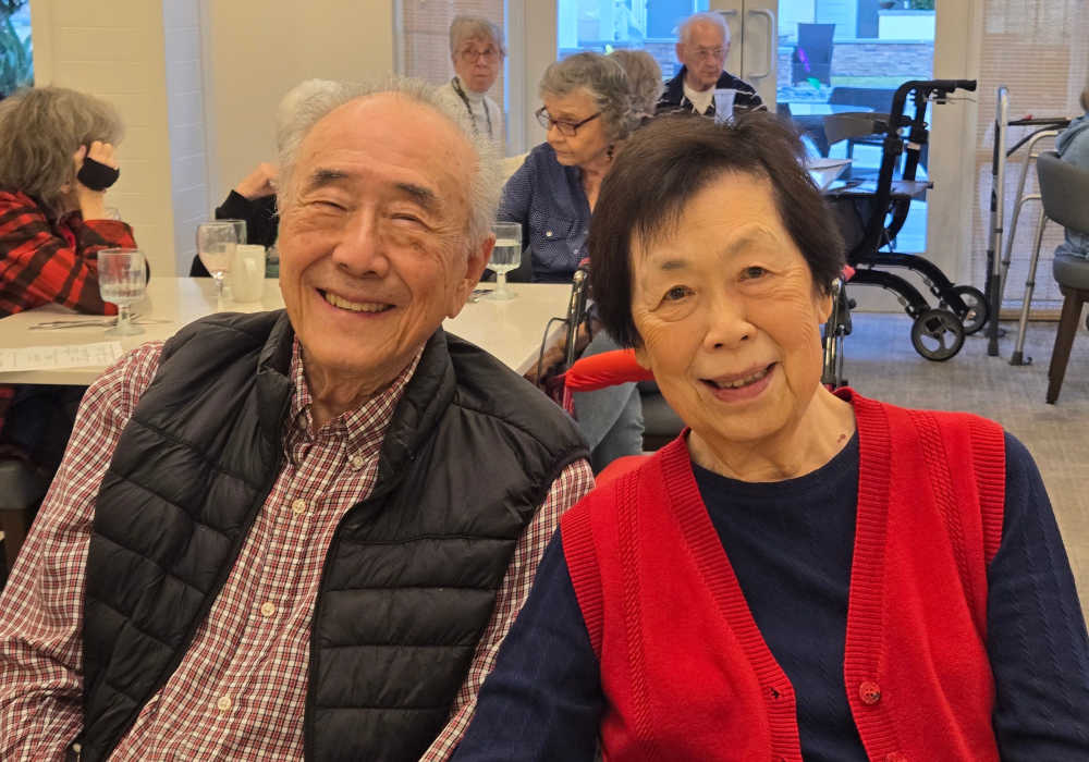 Couple smiling together in a common area