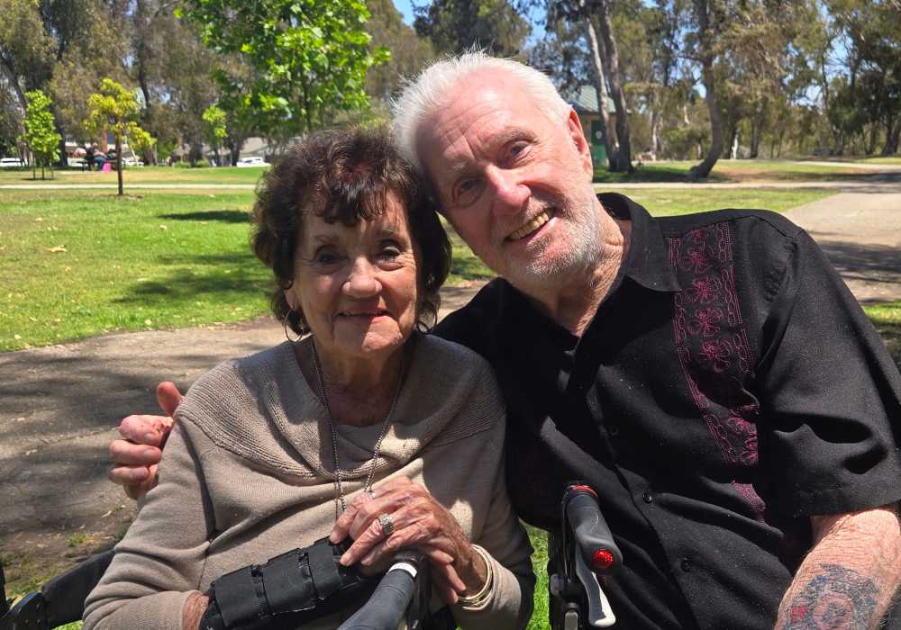 Two residents enjoying a sunny day in the park