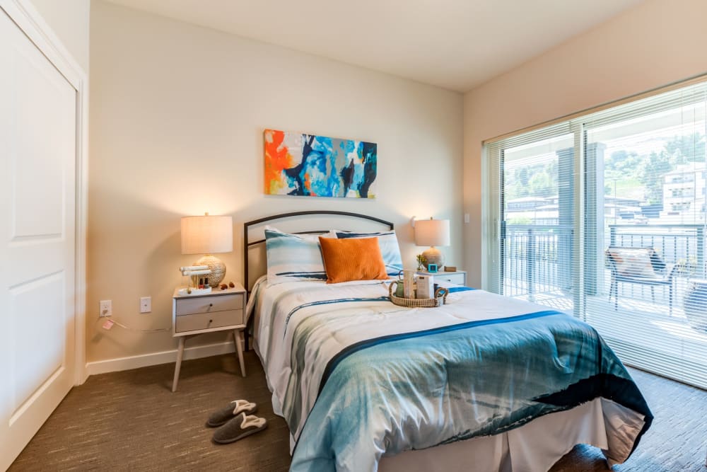 Brightly decorated resident room with artwork and natural light