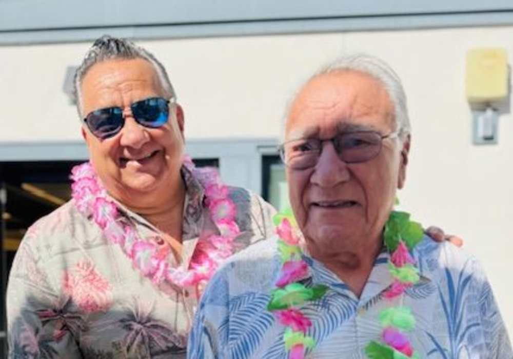 Two residents smiling during a celebration