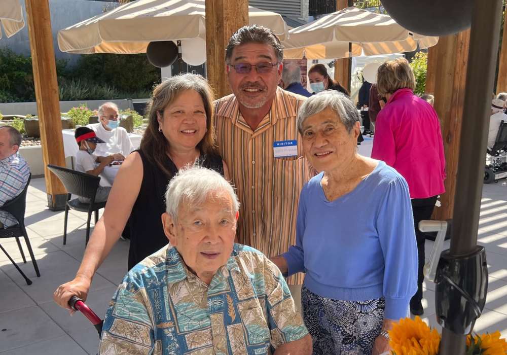Residents and staff enjoying time outdoors.