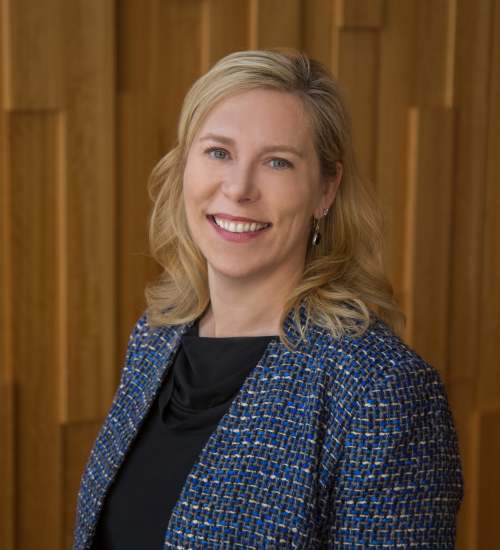Professional portrait of a staff member smiling