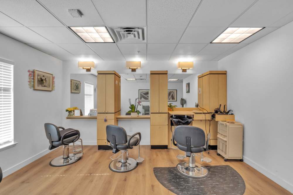 Well-lit interior of a hair salon in the facility