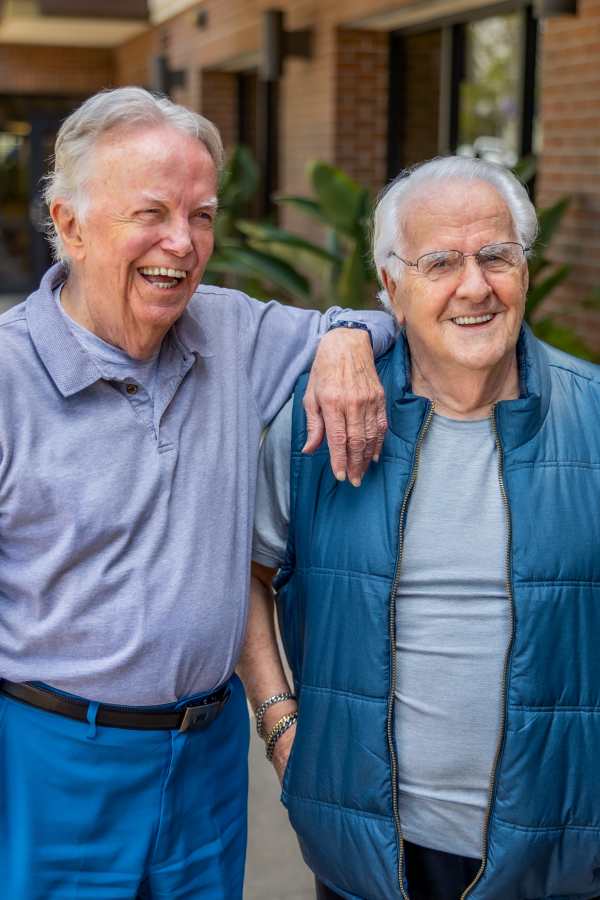 Two happy residents enjoying time outdoors