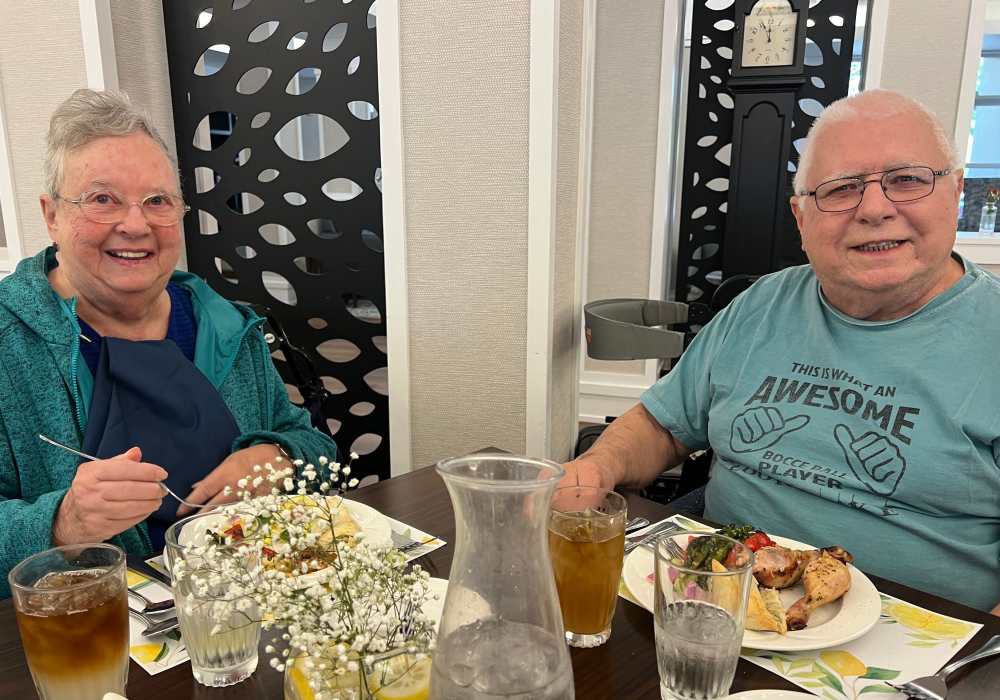 Residents enjoying a meal in the dining room