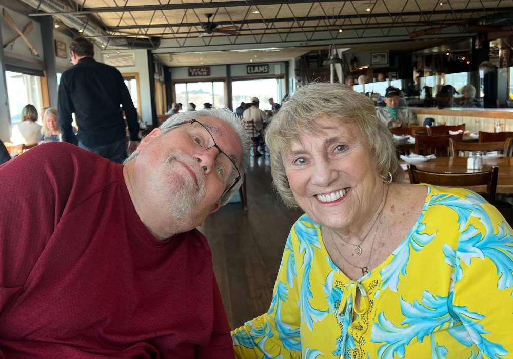 Two smiling residents enjoying an outing