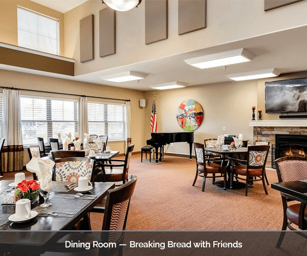 Well-decorated dining room with tables set for meals
