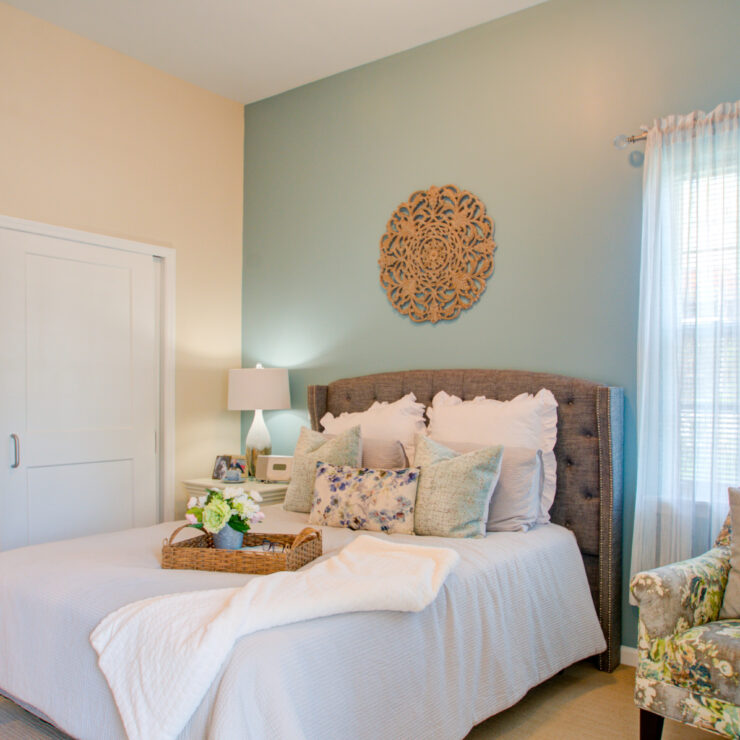 A cozy resident bedroom with floral decor