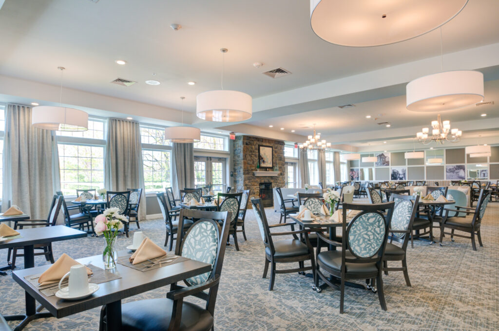 Bright dining room with elegantly set tables