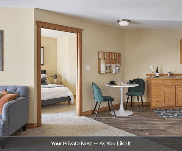 Interior view of a private resident room with kitchenette