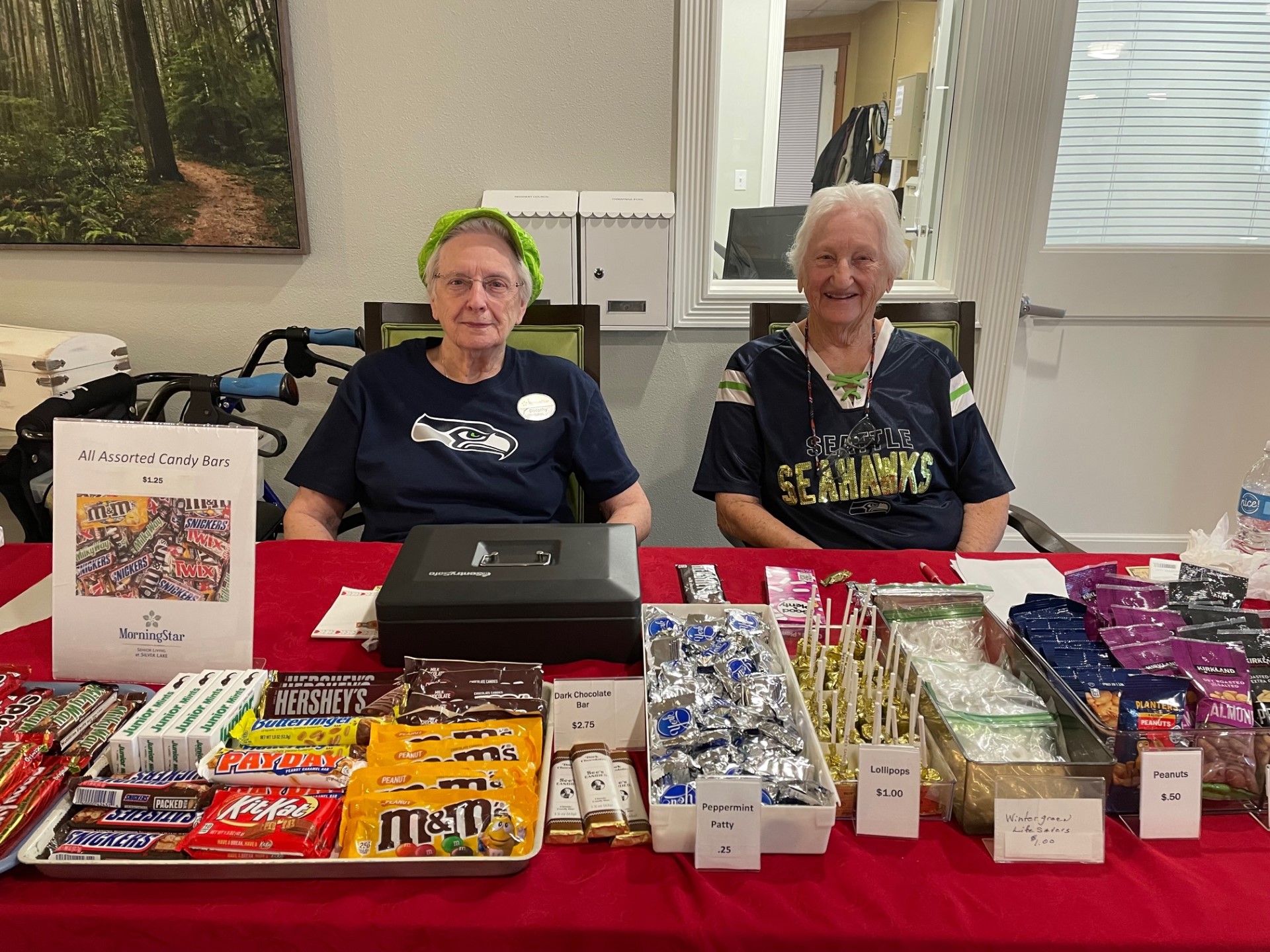 Residents selling candy bars at a fundraiser